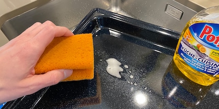 Clean the sheet or grate after each use with a sponge and some kitchen cleaner.