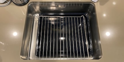 You can prep the grate, trays and support grates in the sink.