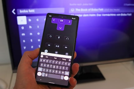 Writing on a TV with your smartphone.