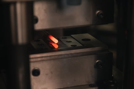 The tip of the screwdriver is heated to 900 degrees before it’s flattened.
