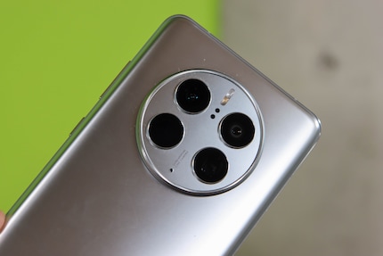 Three cameras and one sensor behind four lenses.