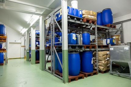 The herbs are stored in bags. he resulting liquid extracts are in the blue containers.