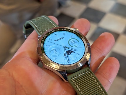The large version of the GT4 with the octagonal case - and the half green bezel.