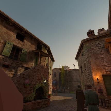 Monteriggioni: het stadje ziet er levendig uit. Links in beeld zie je het puntje van Ezio's neus.