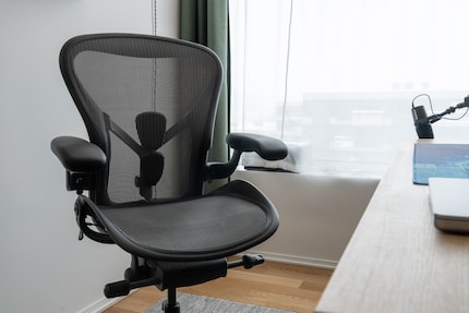 I’d never give up my Herman Miller Aeron. It’s comfortable, ergonomic and well ventilated.
