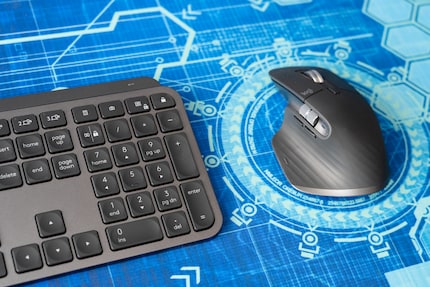Logitech MX Keys and Logitech MX Master: boring but good.