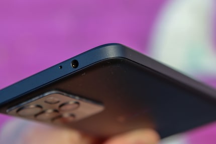 The 3.5-mm headphone jack is at the top of the frame.