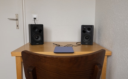 Tables are often positioned in a corner. Acoustically, that’s a bad choice.