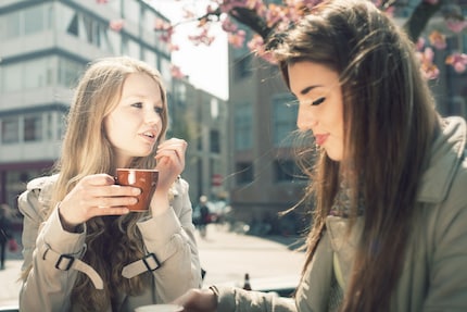 Coffee tastes all the better when you drink it with a friend outside.