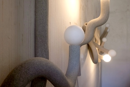 These structures are reminiscent of the way a grapevine grows around a tree.