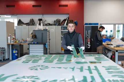 In the past this was manual work. These days, however,  a plotter cuts out the parts.