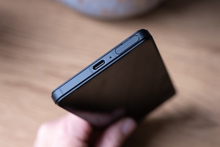 The card slot offers space for microSD and SIM. You can open it by hand.