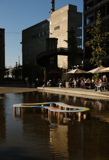 The organically shaped bench in the water basin by Yael Anders is an icebreaker.