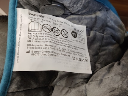 Het label op het verwarmingskussen is te groot en irritant. Op de lange termijn zou ik het eraf knippen.