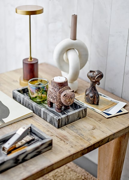 Even a stapler looks more appealing framed by a tray.