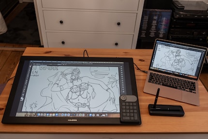 The huge tablet takes up almost my entire workspace.