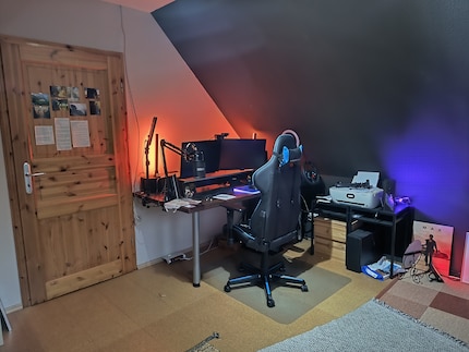 Before: my desk and the area around it look messy, while the sloping roof is overbearing.