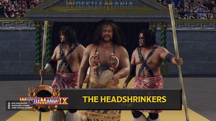 The extensive roster is a big plus point of the game: Here the headshrinkers Samu and Fatu come to the ring with their manager Afa.