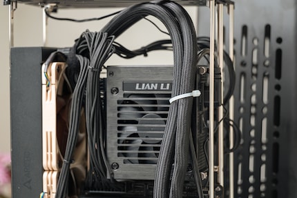 I temporarily attached a cable tie to the power supply due to a lack of other options.
