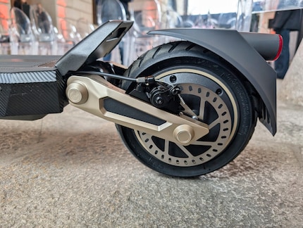The rear axle of the ST3 Pro with disc brakes and suspension.