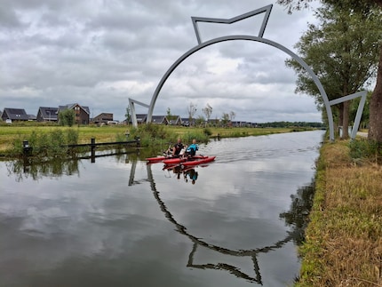 Dit is waar we vooral van genieten: rijden door de finishboog van de Elstedentocht.