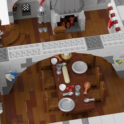 Der große Saal der Normannenburg mit Kamin, Wandverzierungen und einer reich gedeckten Tafel.