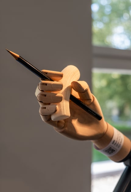 Makkelijker een pen vasthouden: Iual.