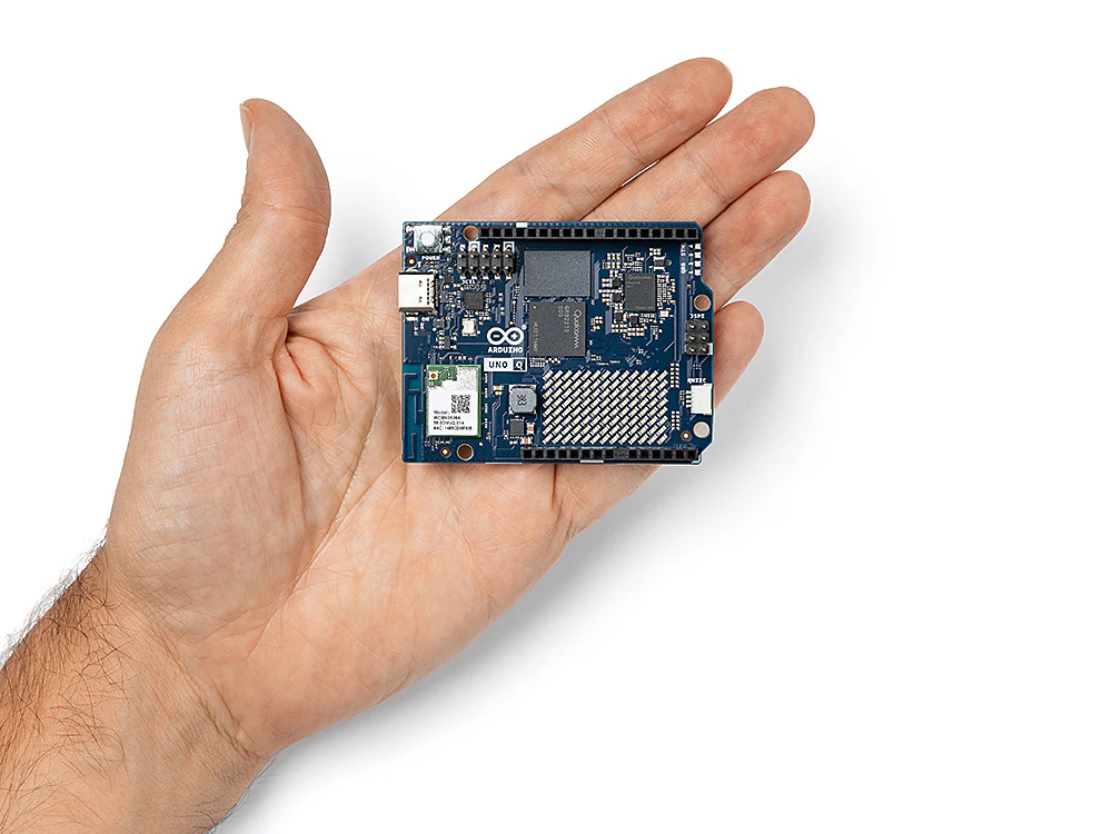 Uno Q in size comparison with one hand.